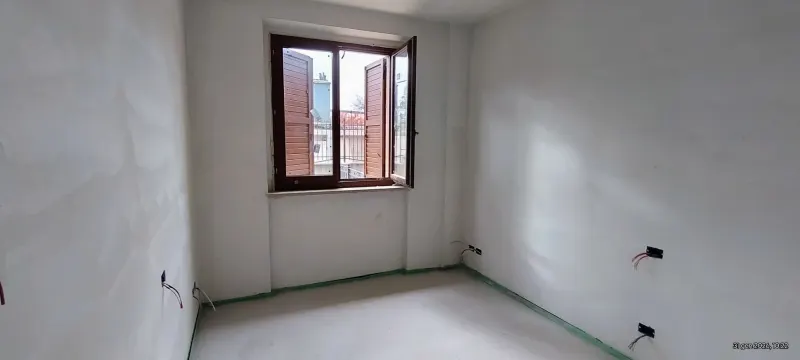 Appartamento al piano terra con giardino e garage · foto 2