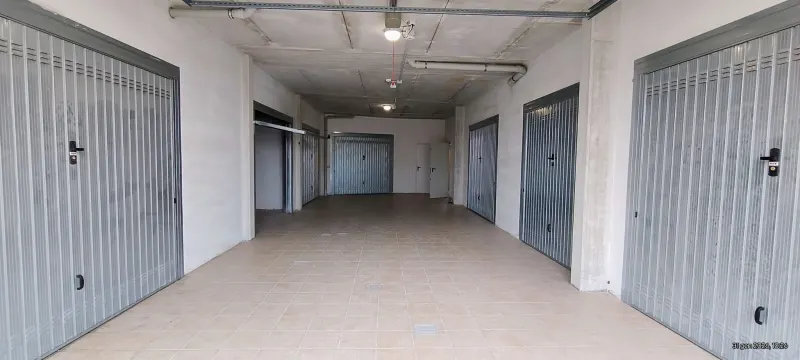 Appartamento al piano terra con giardino e garage · foto 3
